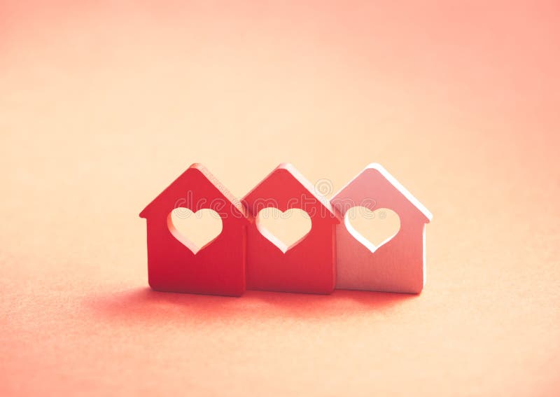 Three small houses with heart royalty free stock photos