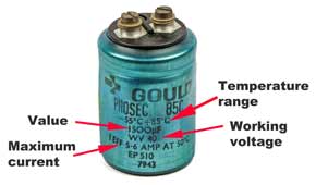Leaded aluminium electrolytic capacitor showing the key parameters marked on the case.