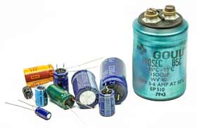 A selection of leaded aluminium electrolytic capacitors small and large